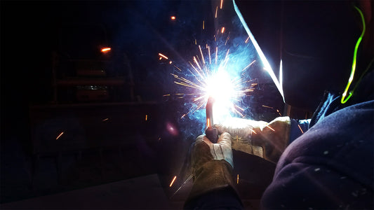 Person welding the Revant Punisher