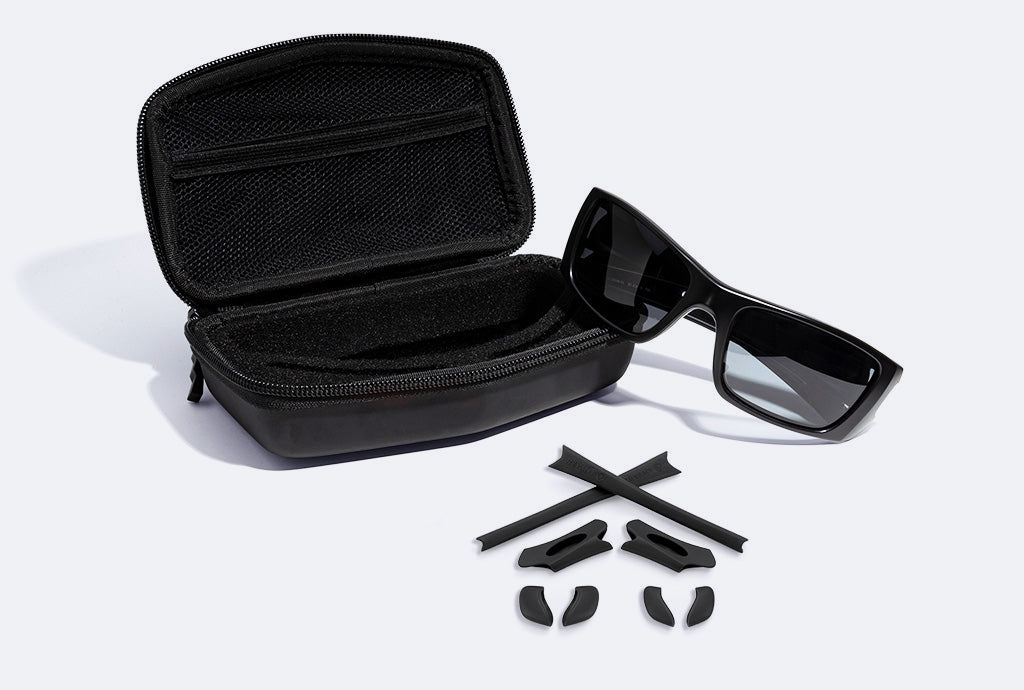 sunglasses case and rubber pieces with sunglasses.