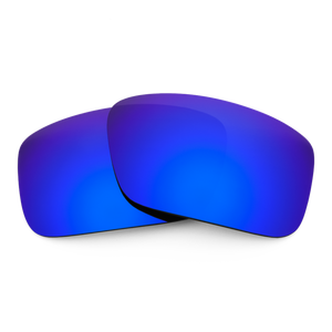 Two Tidal Blue mirrored sunglass lenses laid on top of each other.