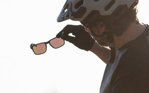 Biker looking through sunglasses