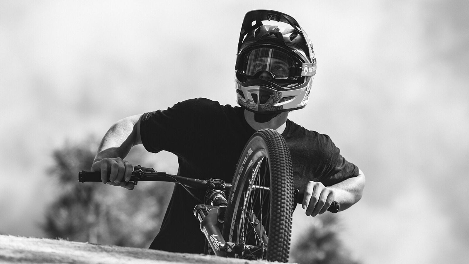 Photo of Carson Storch in gear and with bike