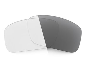 Two Adapt Gray Sunglass lenses laid on top of each other.
