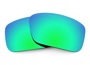Two Emerald Green Sunglass lenses laid on top of each other.