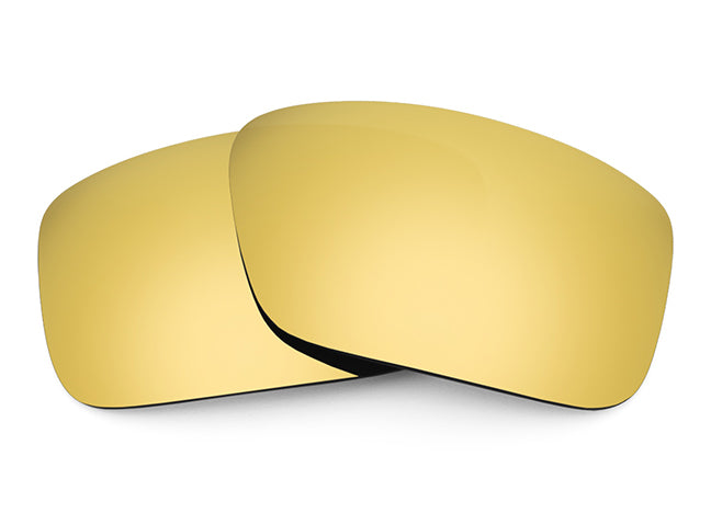 Two Flare Gold Sunglass lenses laid on top of each other.
