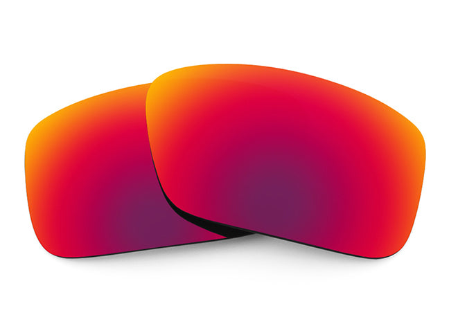 Two Midnight Sun Sunglass lenses laid on top of each other.