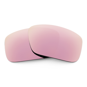Two Rose Gold mirrored sunglass lenses laid on top of each other.