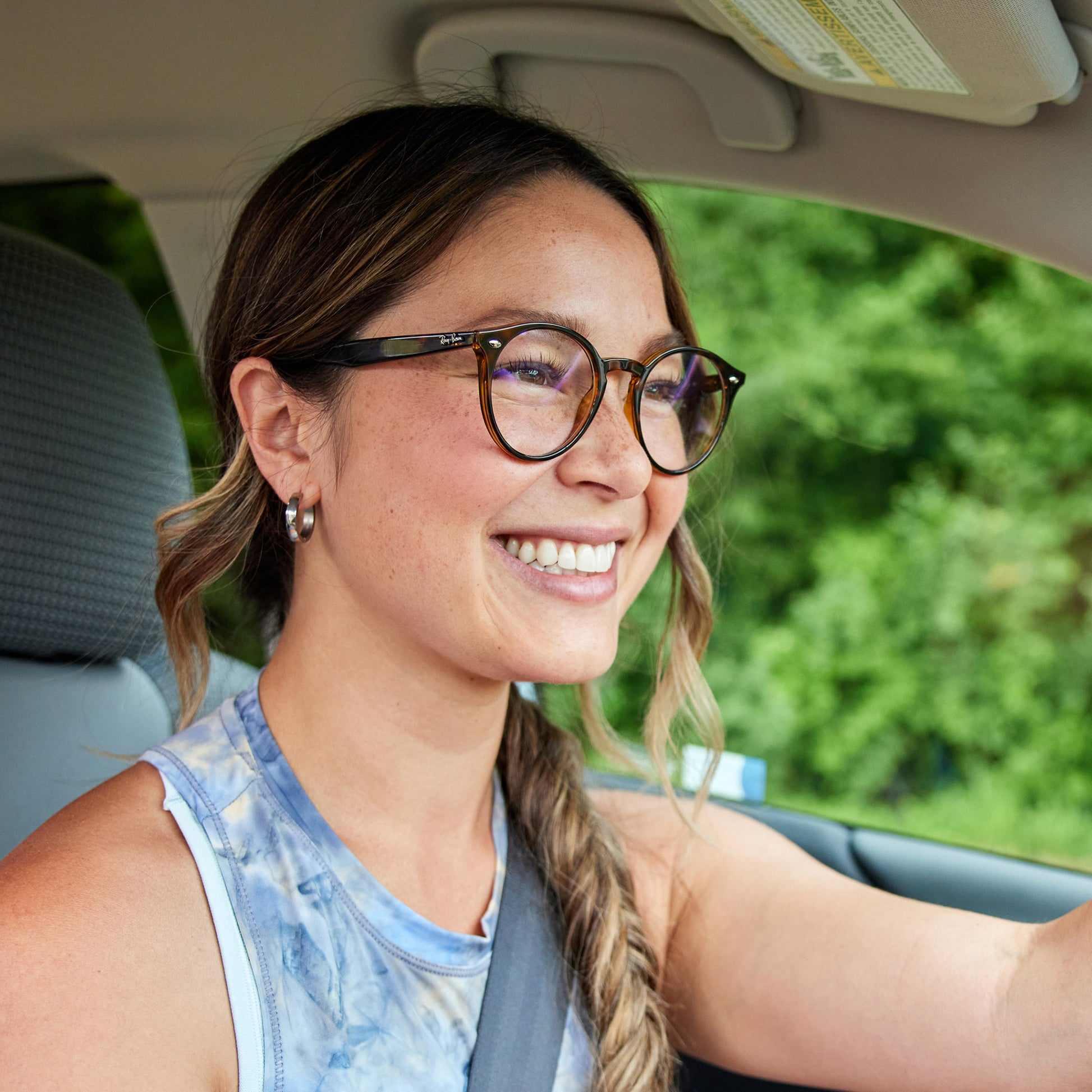 a person wearing sunglasses with crystal clear lenses