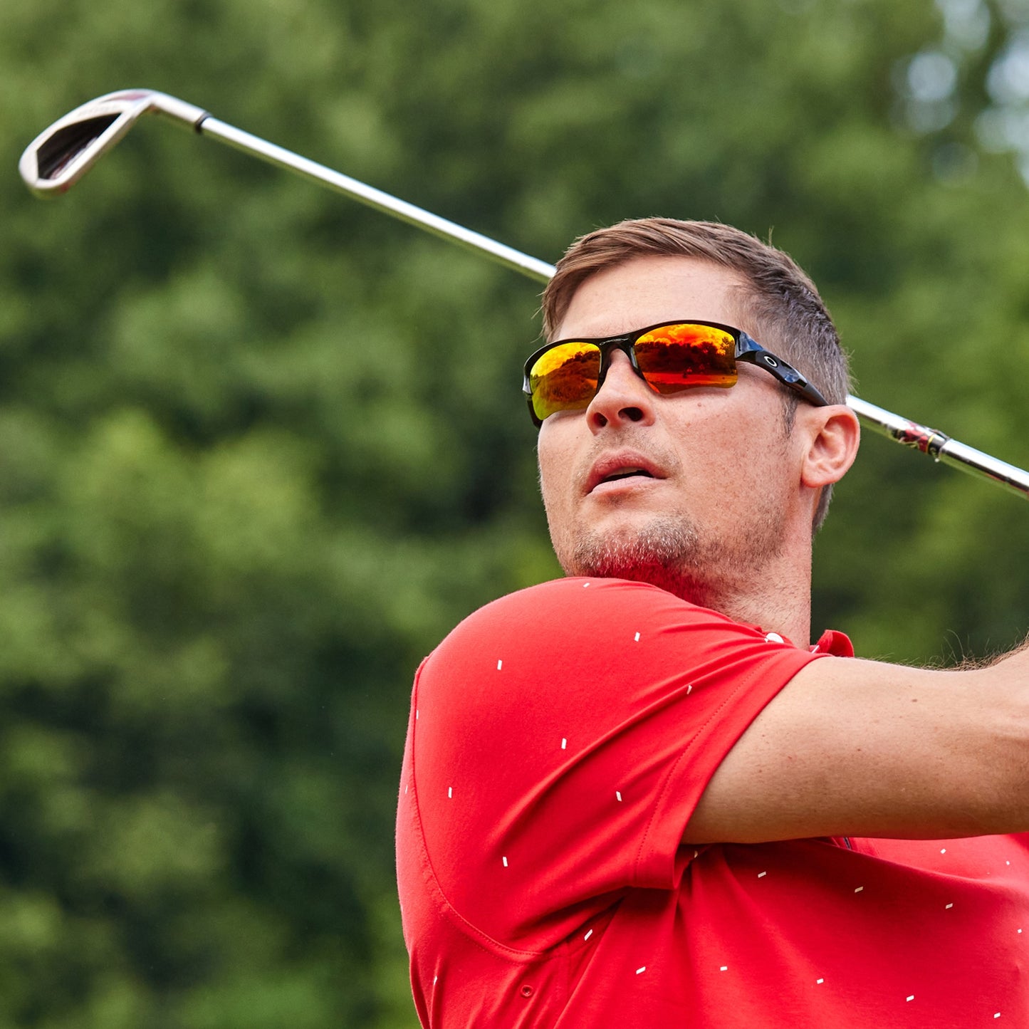 a person wearing sunglasses with midnight sun lenses