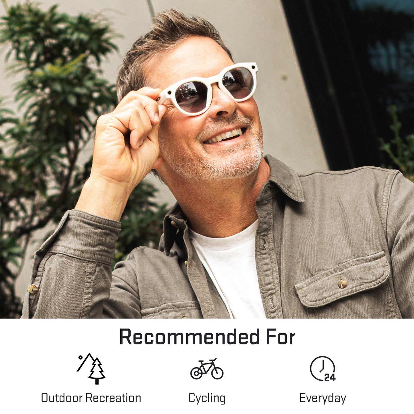 a person wearing sunglasses with adapt gray photochromic lenses